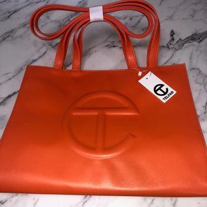 Telfar Medium orange shopping bag